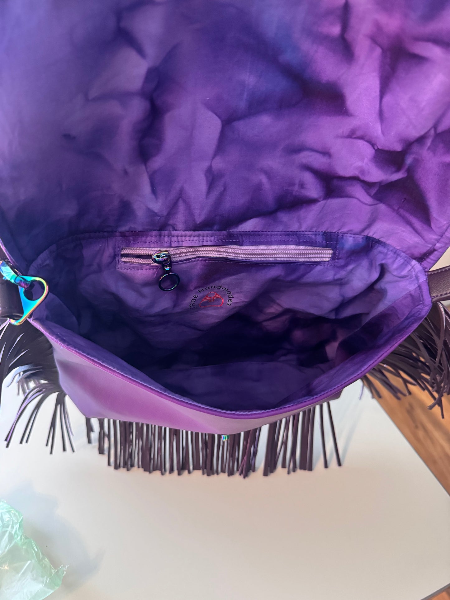 Purple fringe purse
